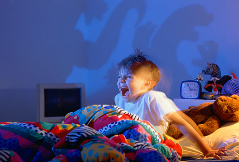 getty rm photo of little boy waking from nightmare